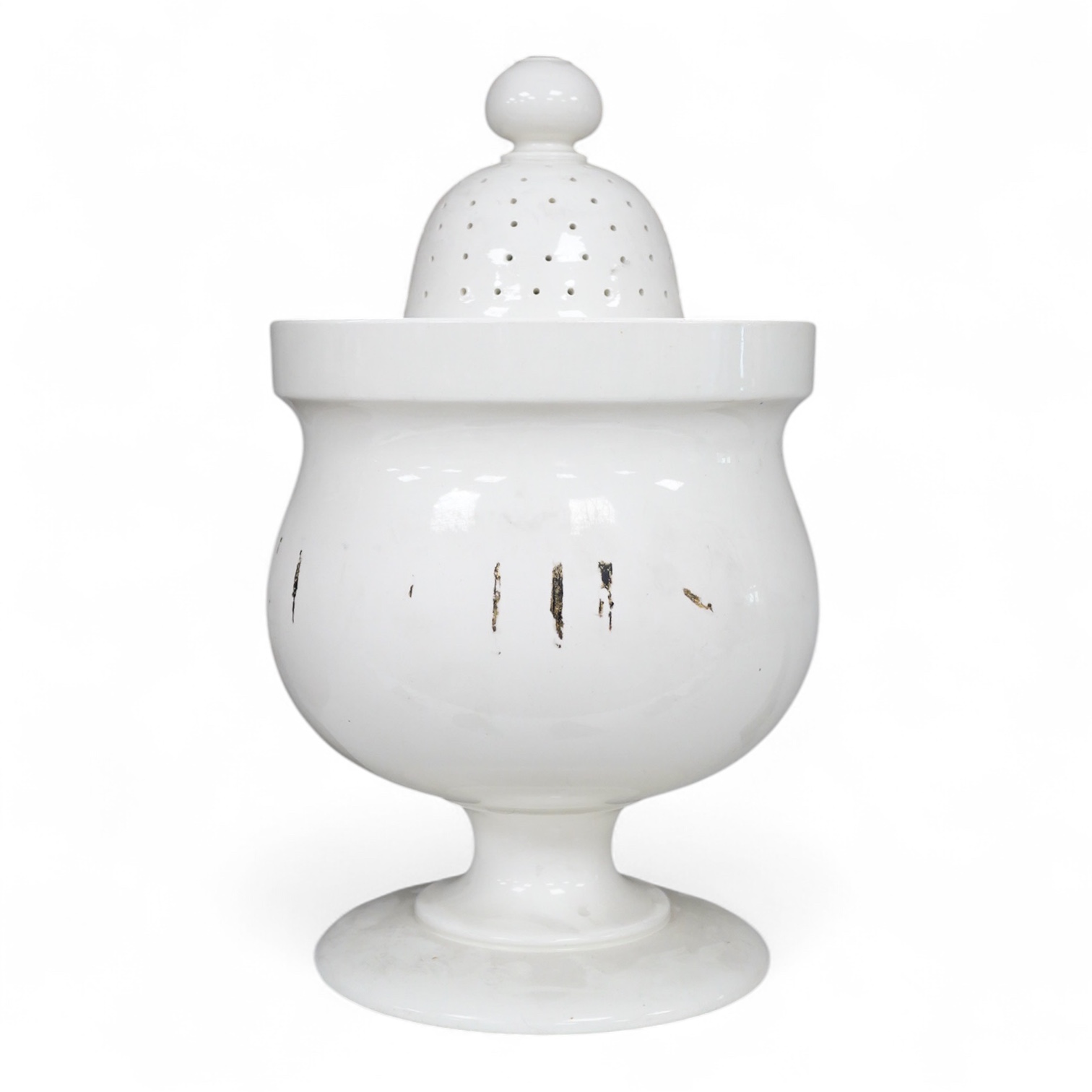 A Victorian pottery pedestal leeches jar and pierced cover, with the remains of the painted word ‘leeches’ around the body of the jar, 30.5cm high